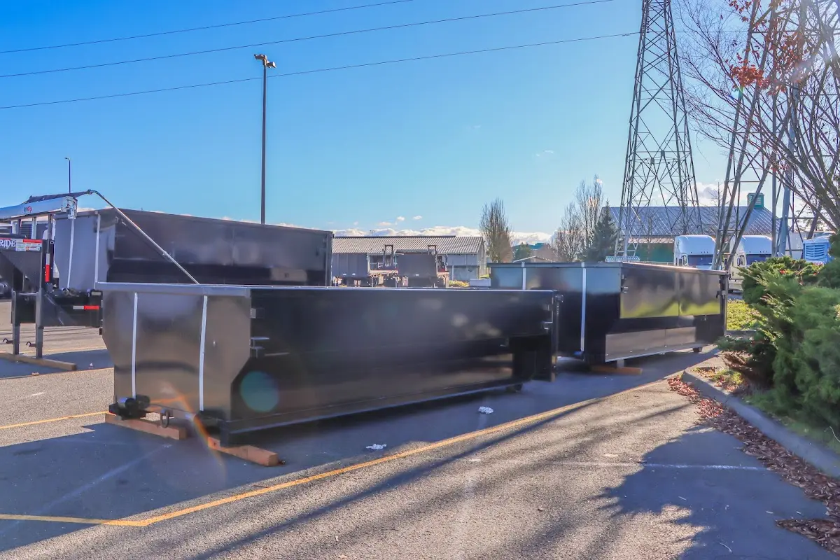 Roll-off dumpster ready for waste disposal at job site for 6 Yard Dumpster Rental in Springfield